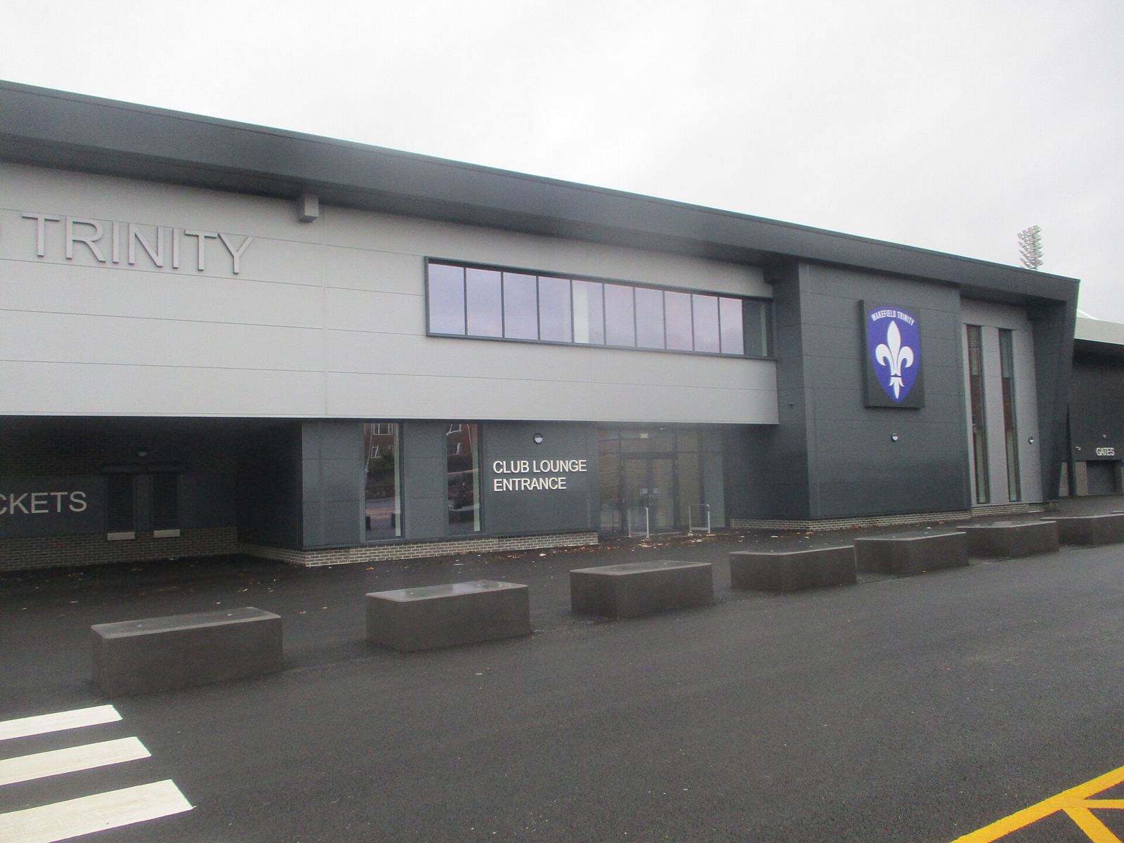 The new East Stand at Belle Vue, Wakefield, with the Trinity crest and Club Lounge entrance